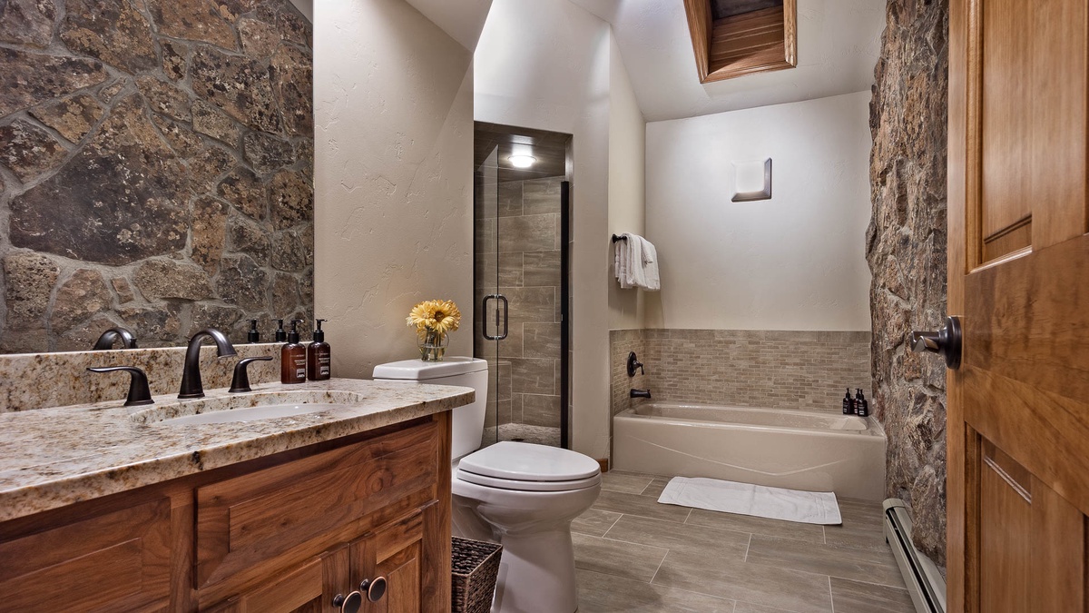 Upper shared bathroom in hallway