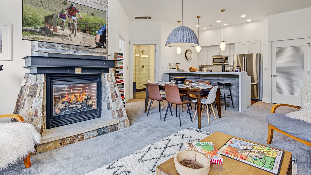 Great Room in Summer, Main Level - Fireplace with Dining Area and seating area