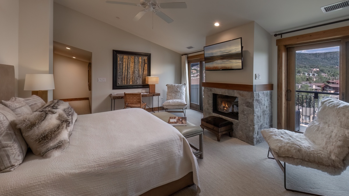 Bedroom 1, Main Level - Primary king suite with fireplace and TV