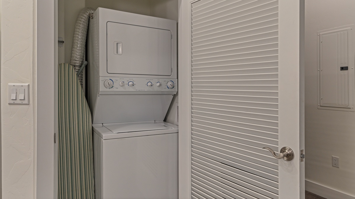 Laundry closet adjacent to the kitchen