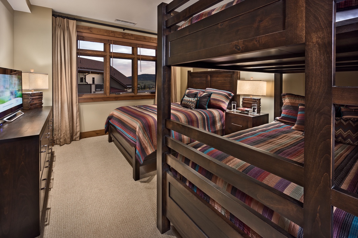 Bedroom 3, Main Level - Family suite with a queen bed and a queen over queen bunk