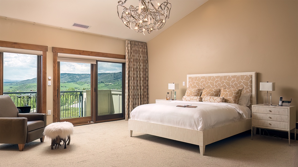 Bedroom 1, Main Level - Primary king suite with fireplace and TV