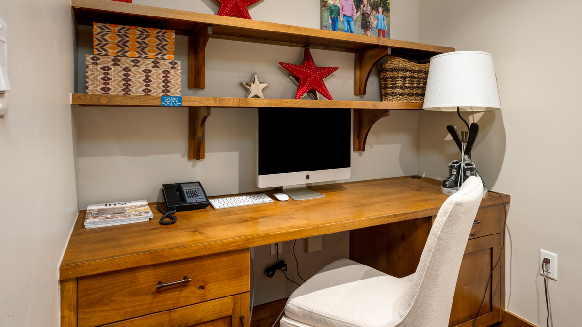Office, Main Level - Built-in desk workspace with shelving