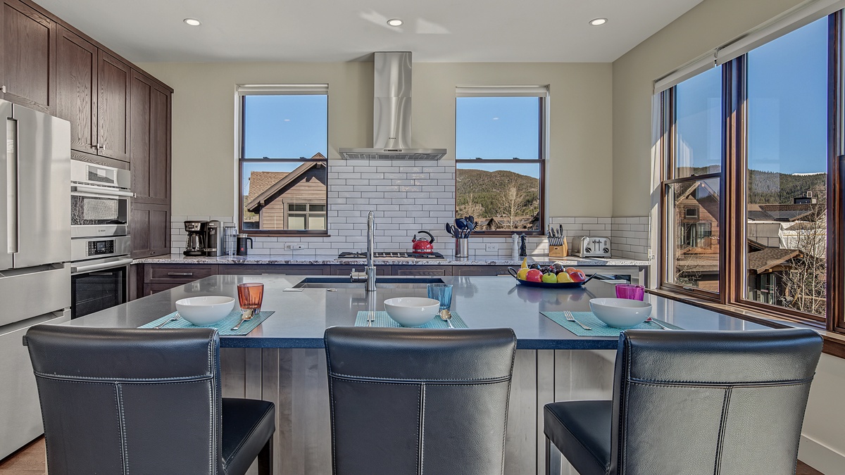 Kitchen, Main Level - Island with bar seating and range