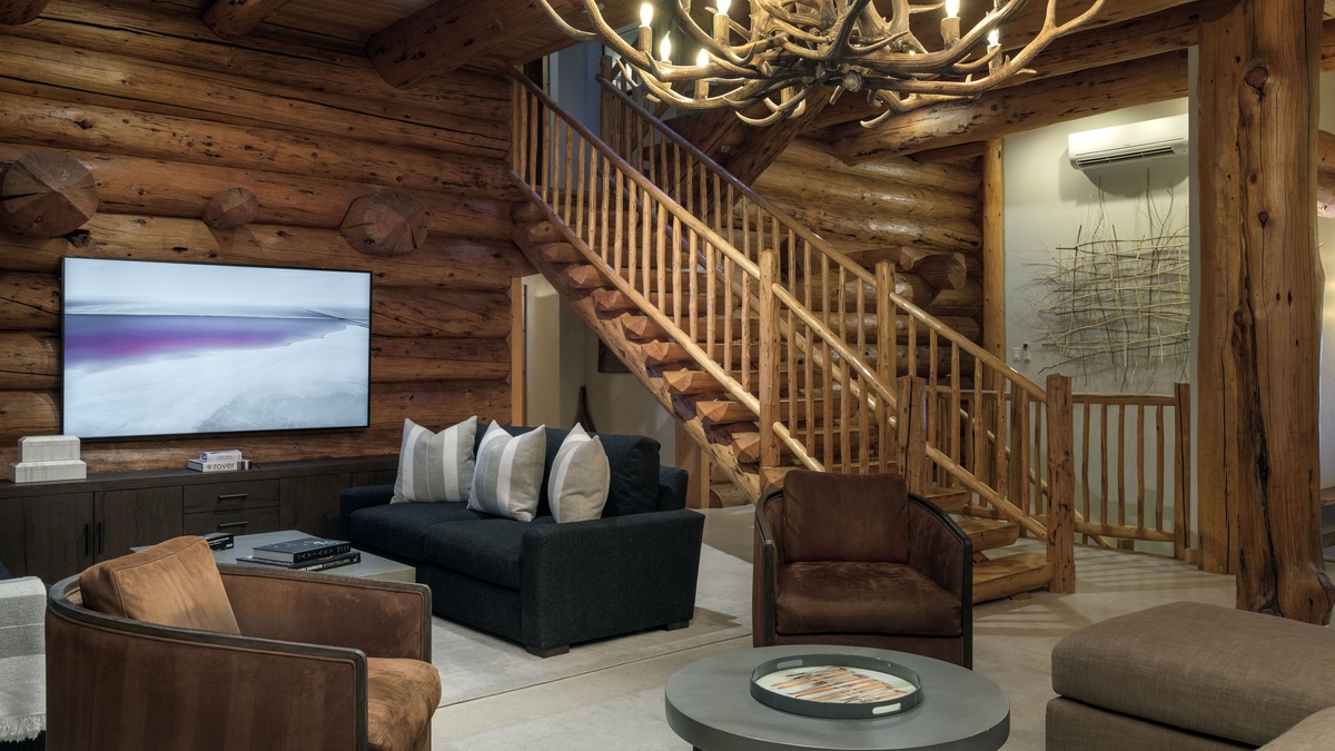 Great room and stairway access to bedrooms and downstairs entertainment room