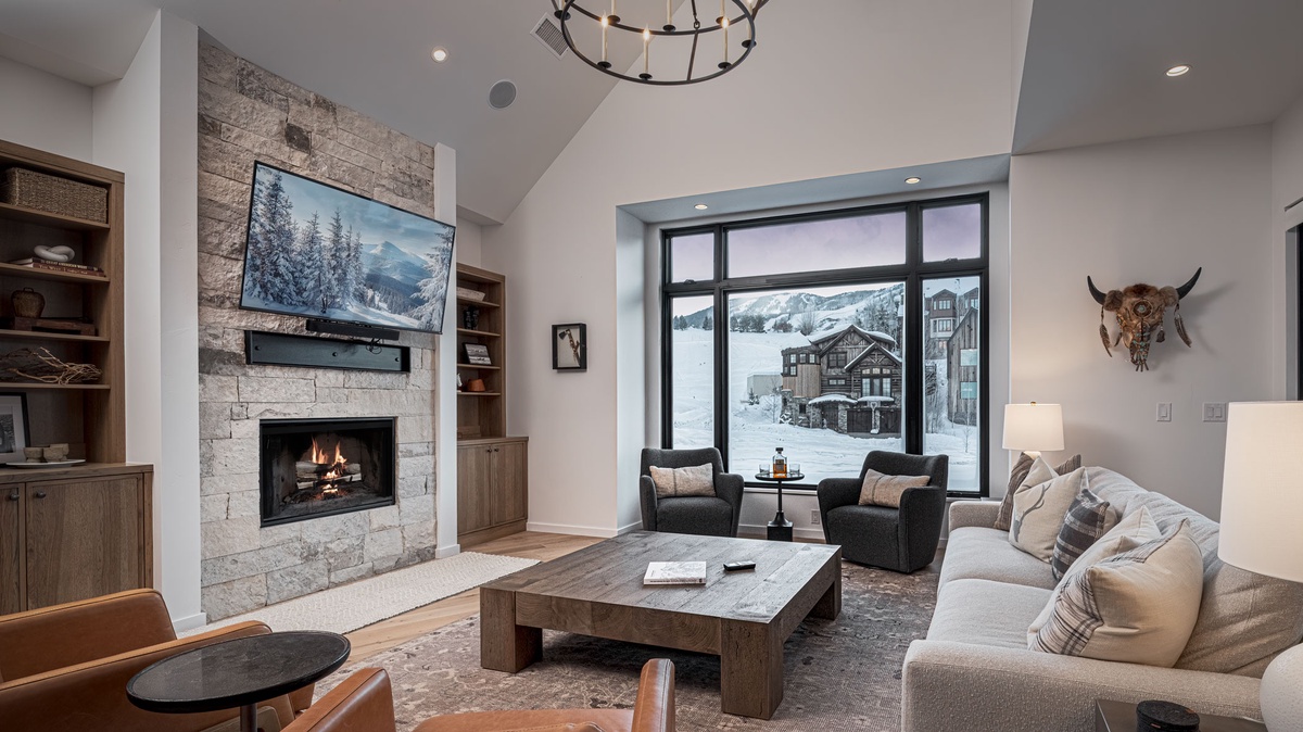 Great Room, Upper Level - Seating area with fireplace and TV