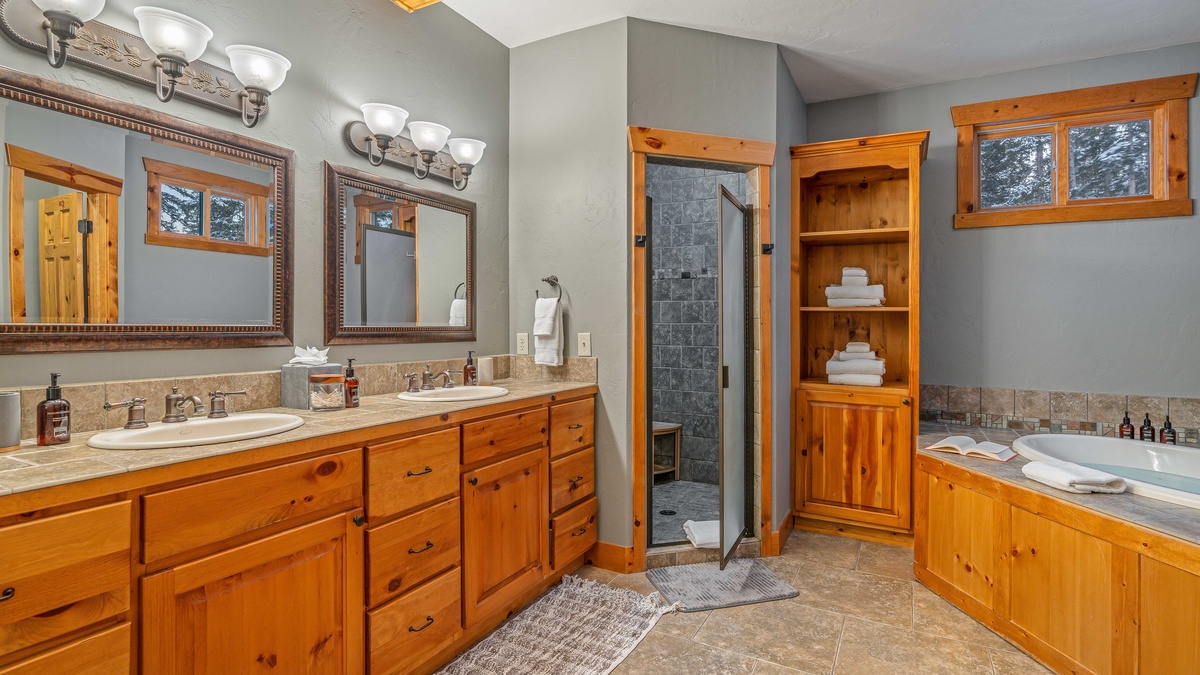 Bedroom 1, Main Level - Primary king ensuite with dual vanities and soaking tub