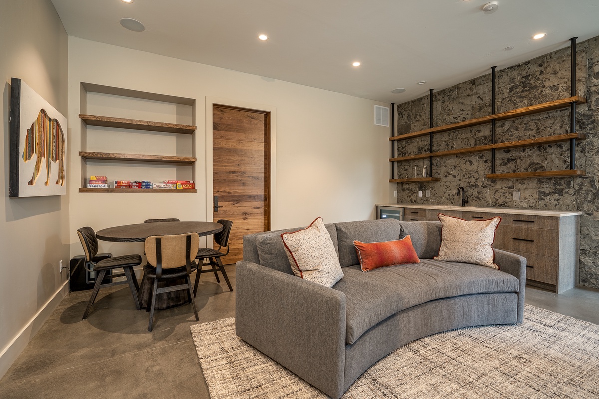 Kids den on lower level with TV, game table