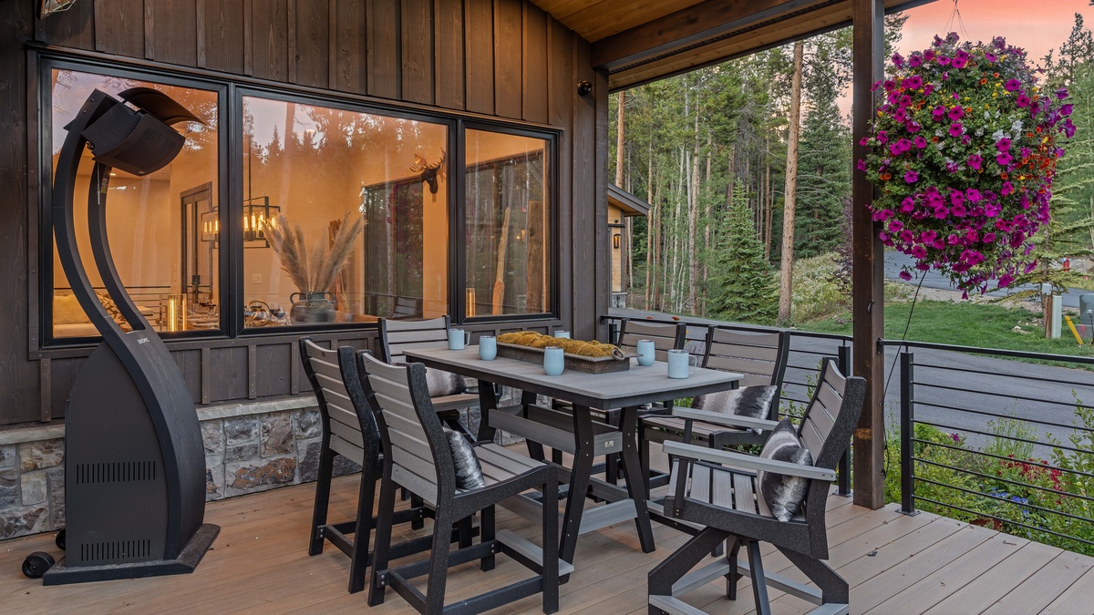Hightop seating on the main level deck with outdoor patio heaters