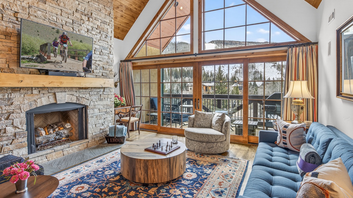 Great Room, Main Level - Fireplace beside seating area