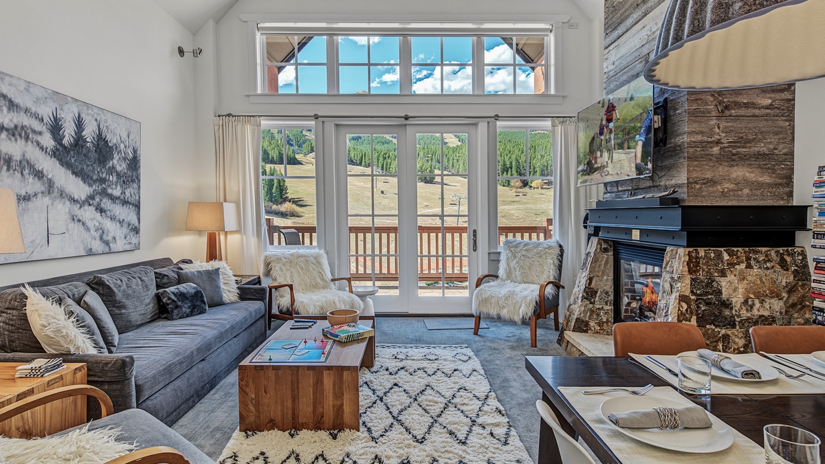 Great Room in Summer, Main Level - Fireplace with TV and seating area
