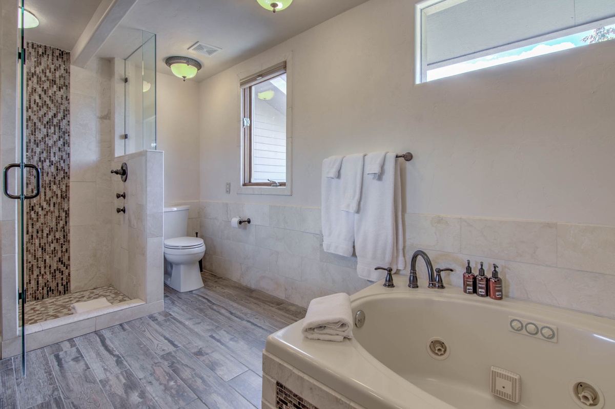 Bedroom 1, Main Level - Jacuzzi tub in primary bath