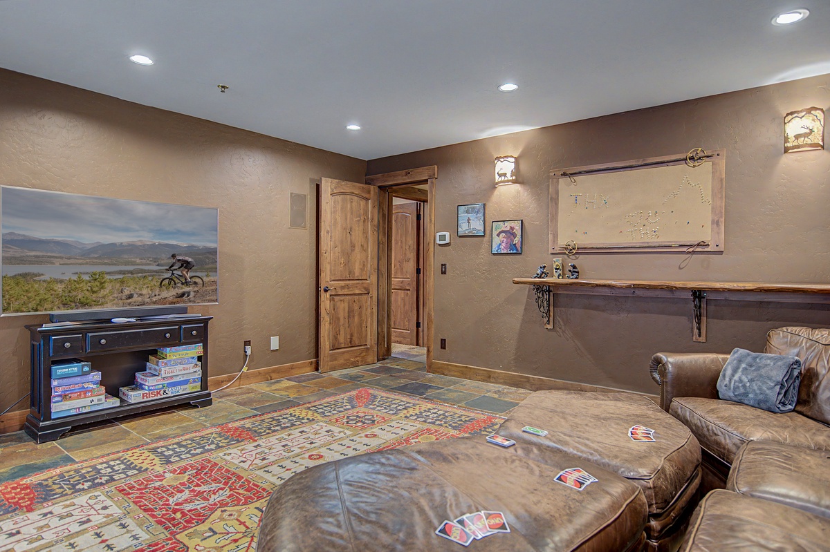 Family Room, Lower Level - Seating area with game table