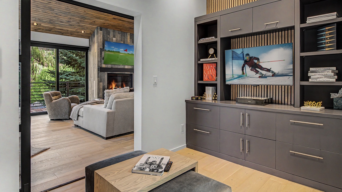 Entertainment Room, Main Level - There is a queen sleeper sofa located in this room.