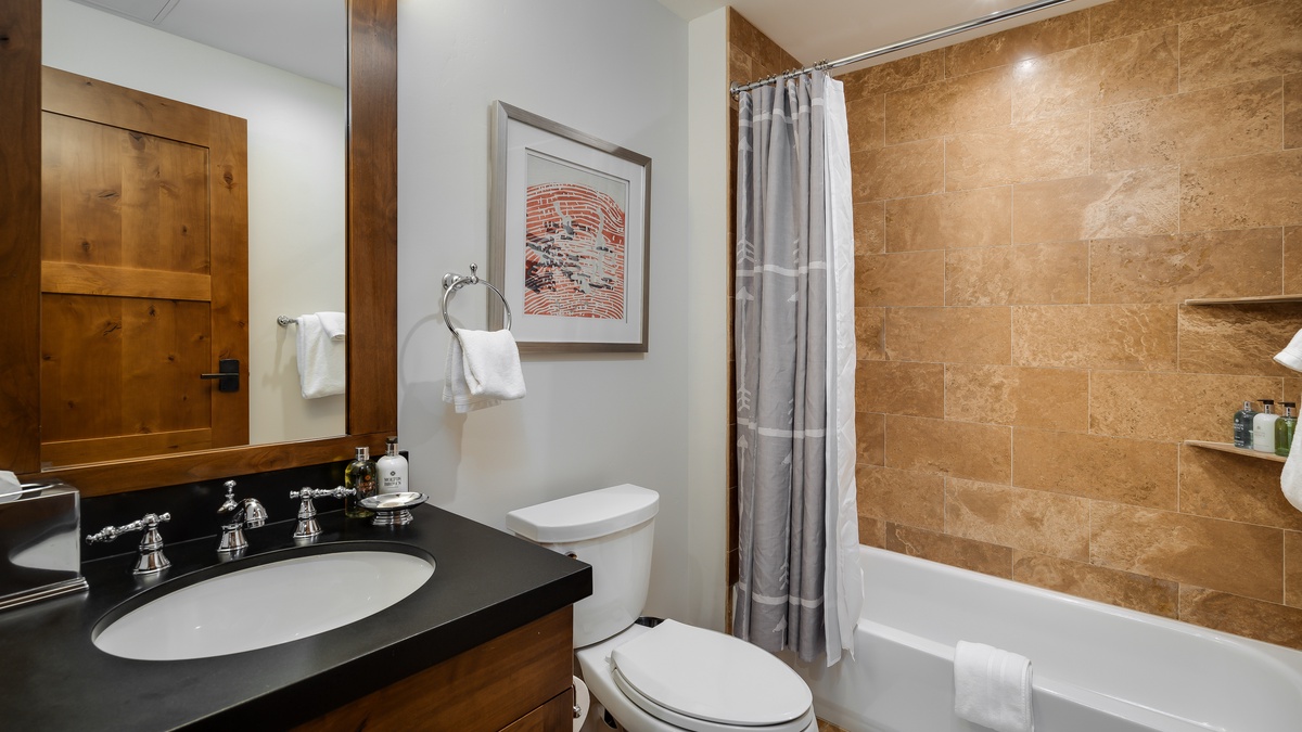 Shared Bathroom, Main Level - Hall bathroom adjacent to Bedroom 3
