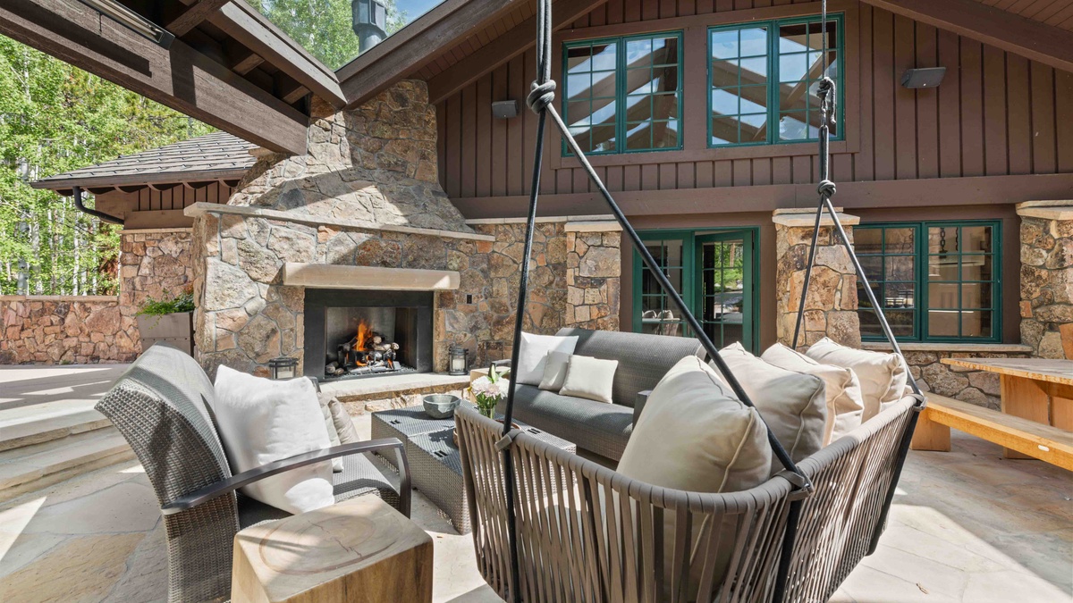 Swing featured in the outdoor upper level living room