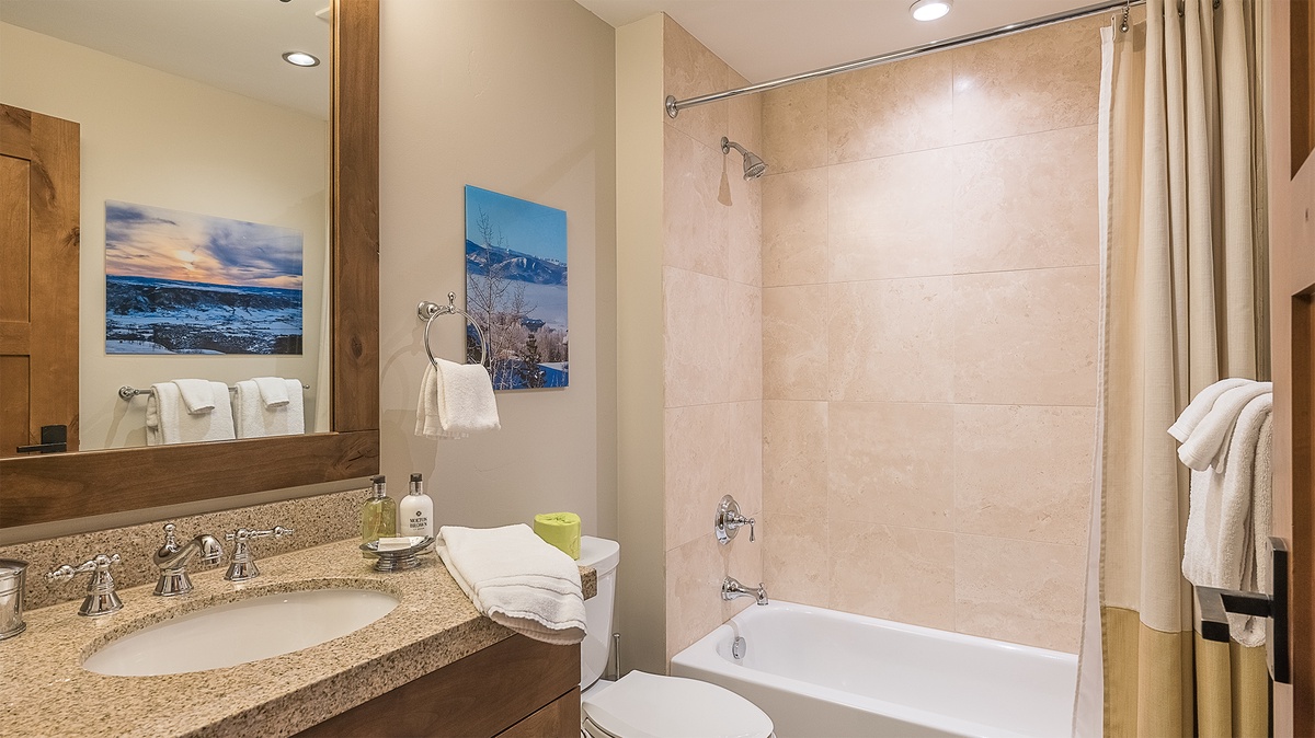 Shared Bathroom, Main Level - Hall bathroom adjacent to Bedroom 2