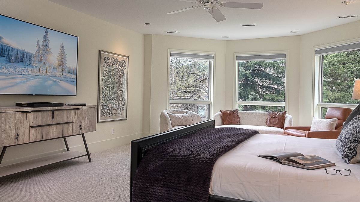 Bedroom 1, Upper Level - Primary suite with large modern TV