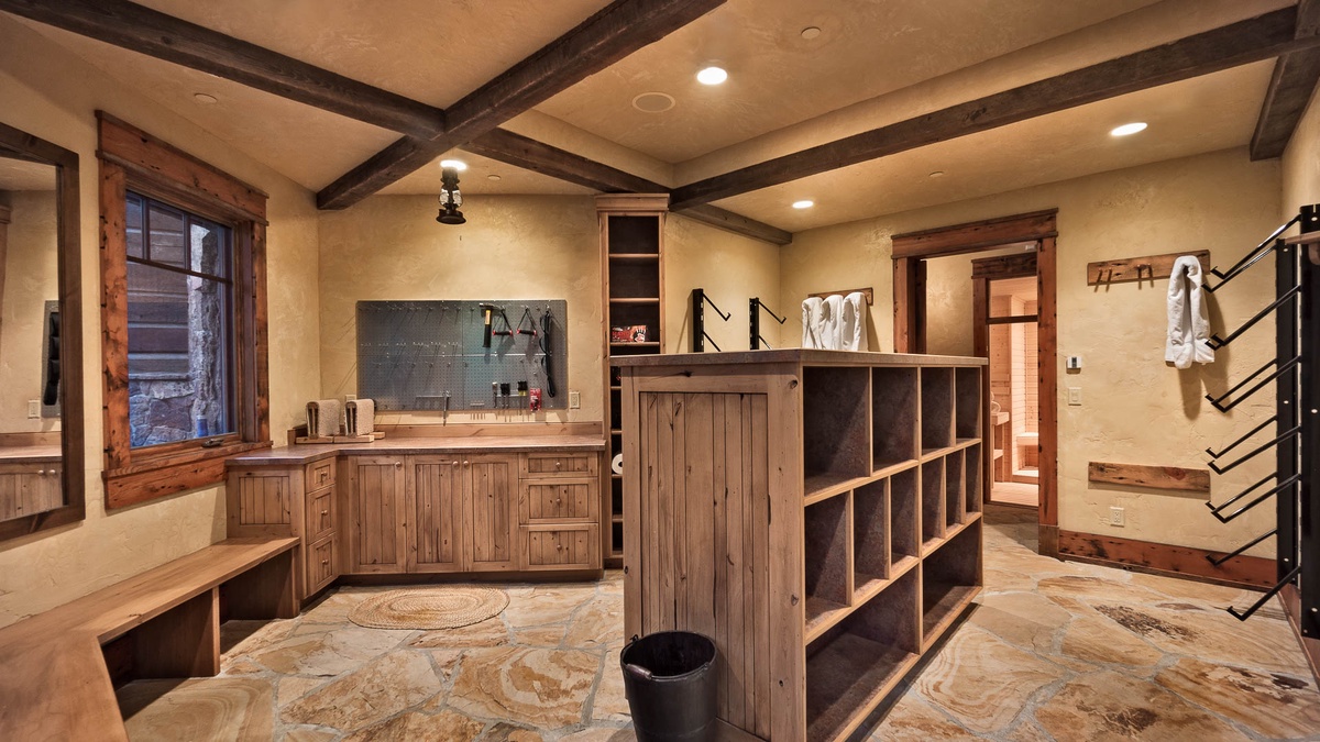 Gear storage room, hot tub access, lower level