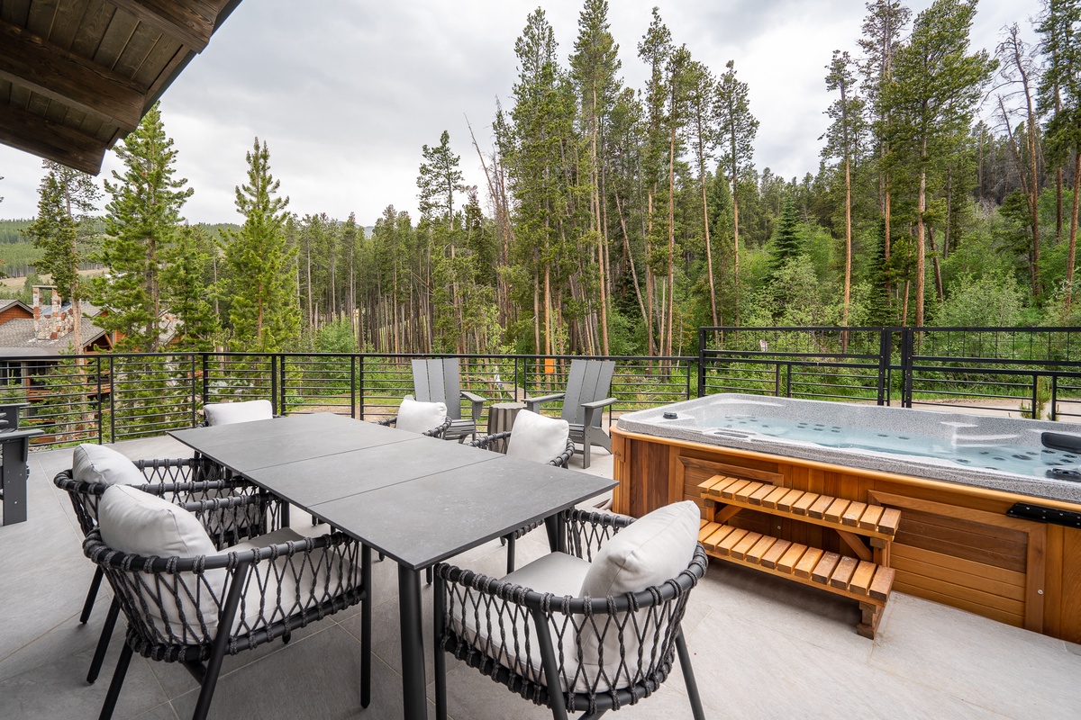 One of two decks on upper level with hot tub