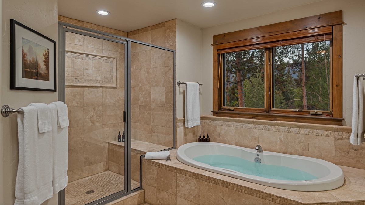 Bedroom 1, Upper Level - Primary king ensuite with soaking tub and shower