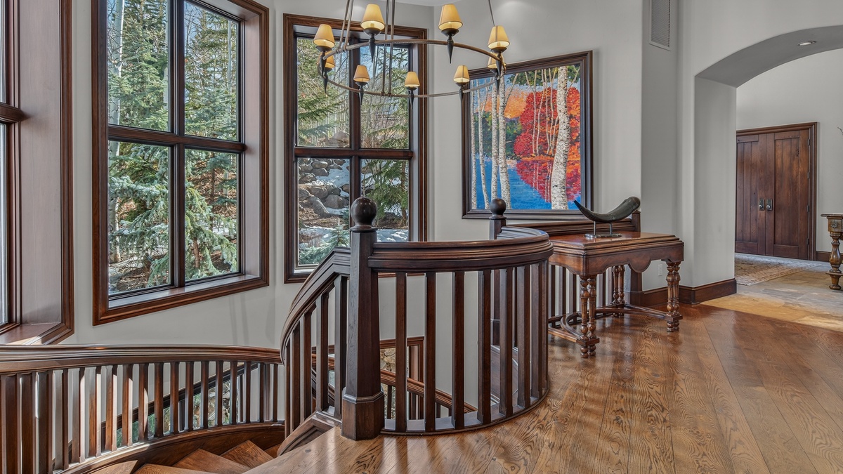 Chandelier over the staircase to the lower level
