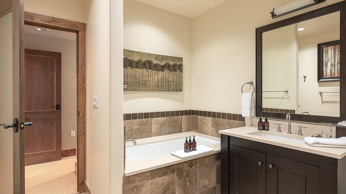 Hall Bathroom, Main Level - Shared hallway bath adjacent to Bedrooms 4 and 5