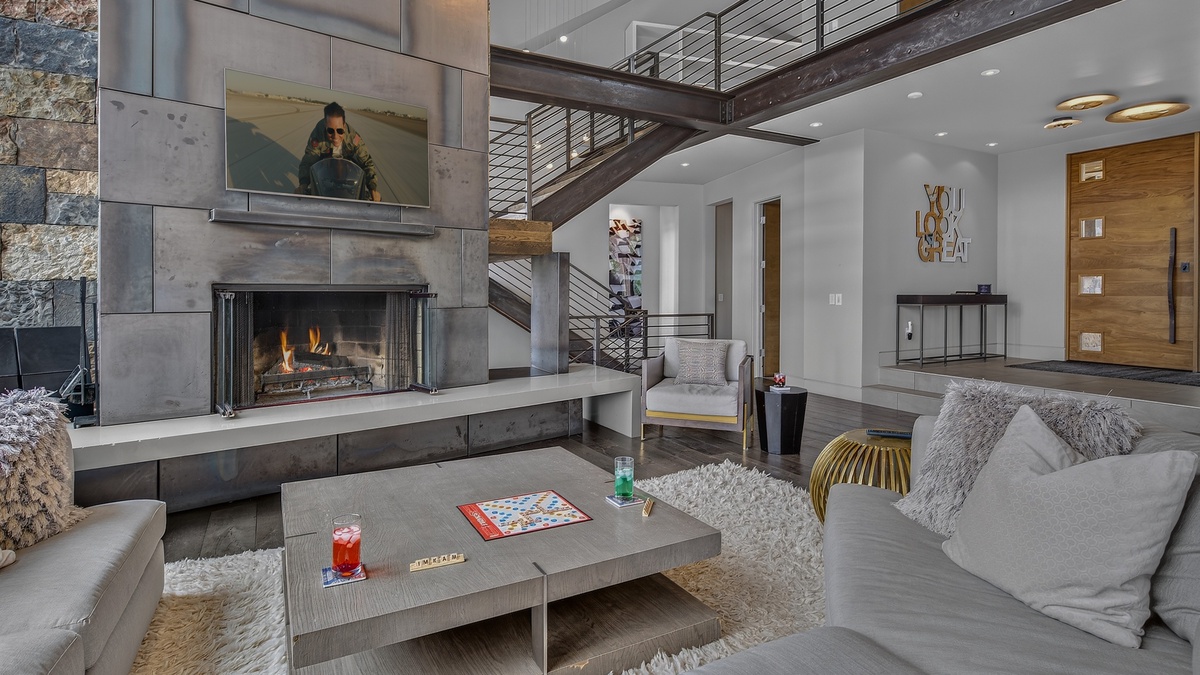 Great Room, Main Level - Fireplace with TV and seating area
