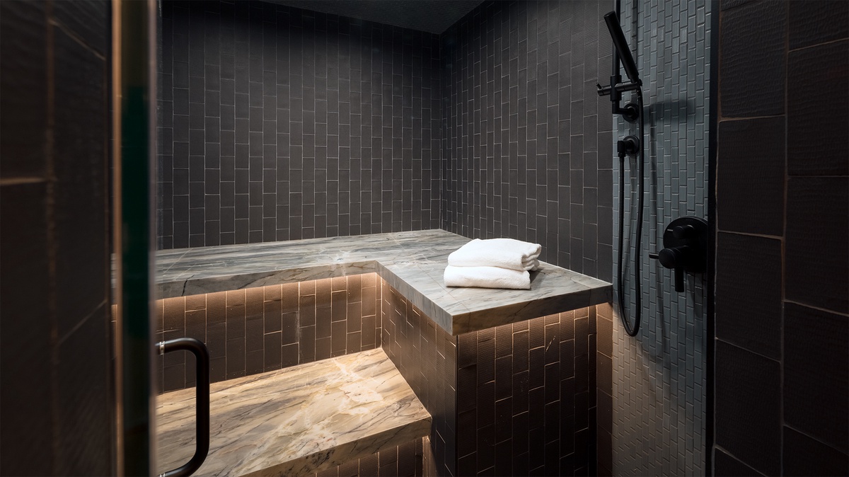 Sauna, Main Level - Private spa with tiled seating and walk-in shower