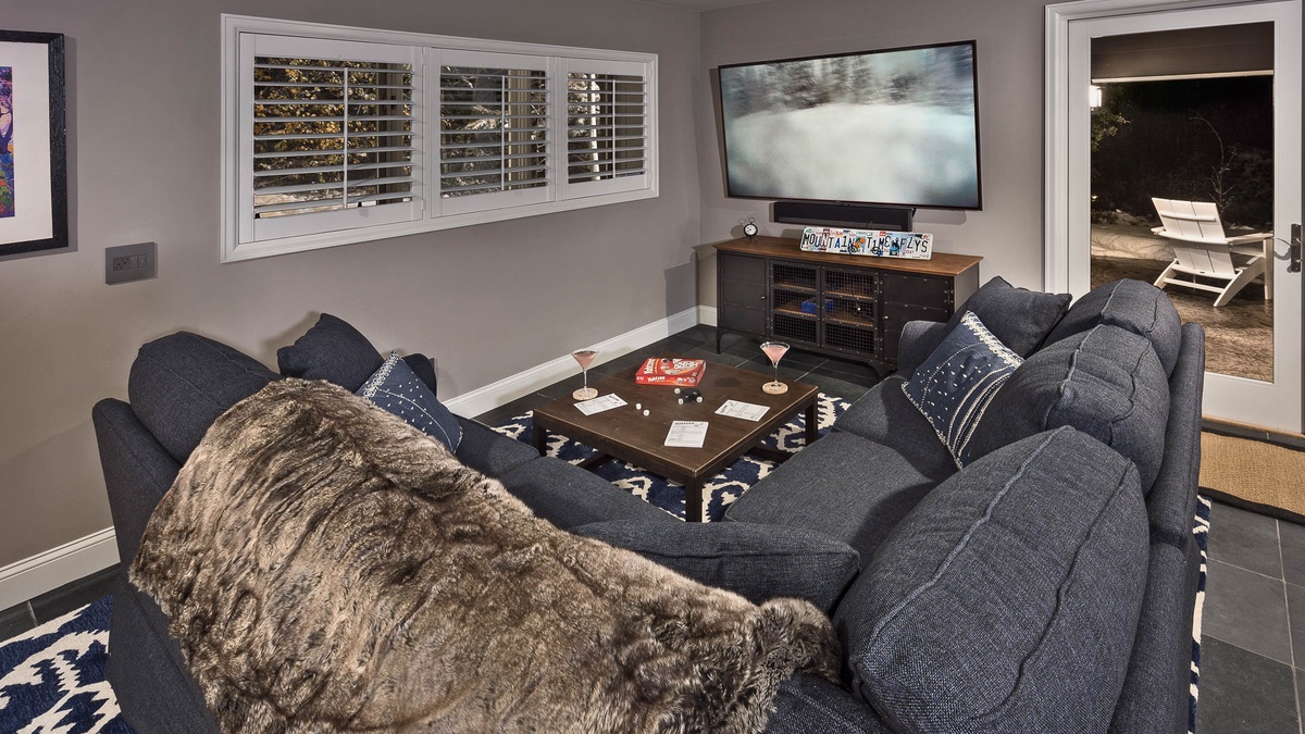 Lower level family room with large TV