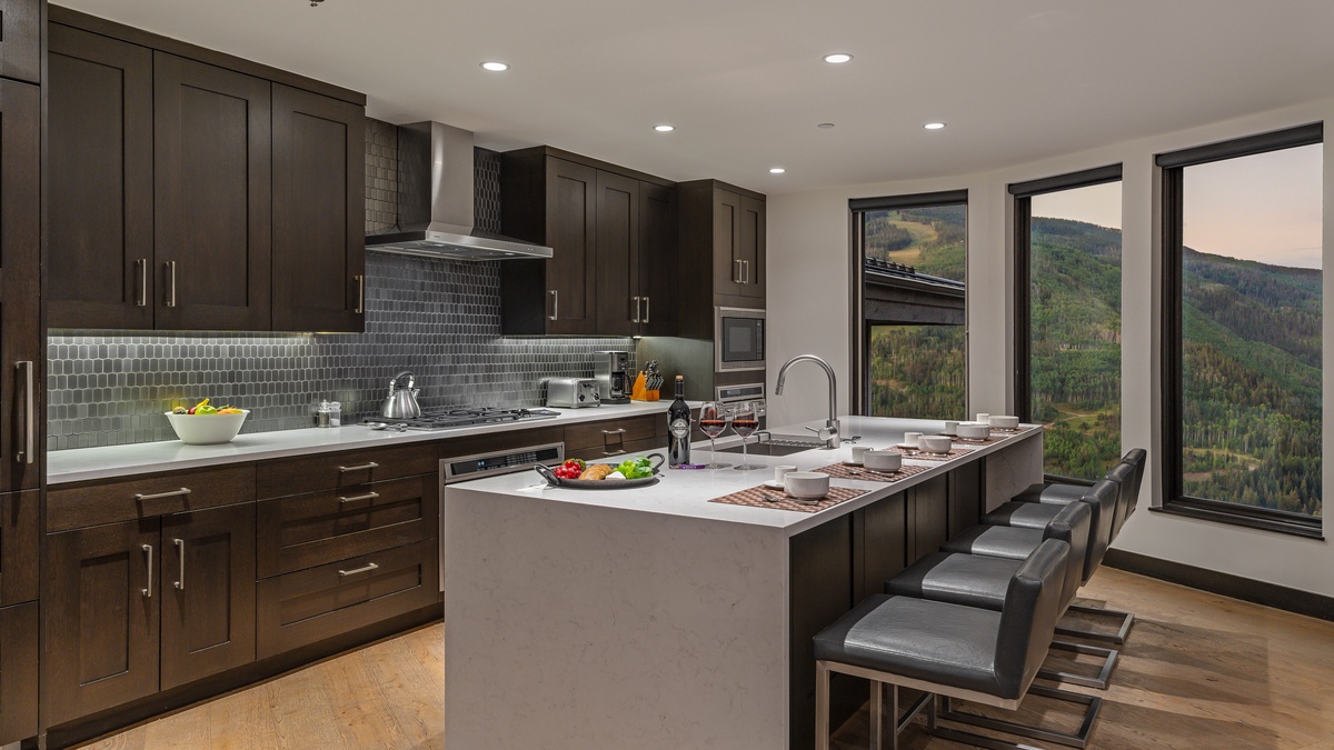 Gourmet kitchen with breakfast bar seating