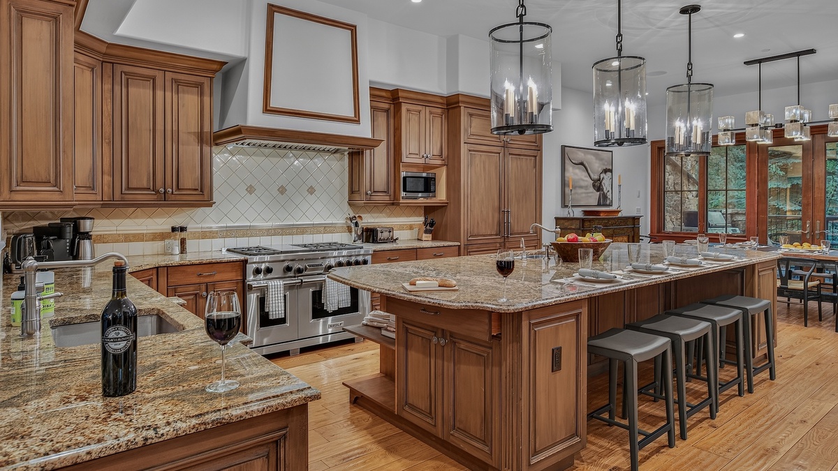 Kitchen, Main Level - Island with seating and pendant lighting