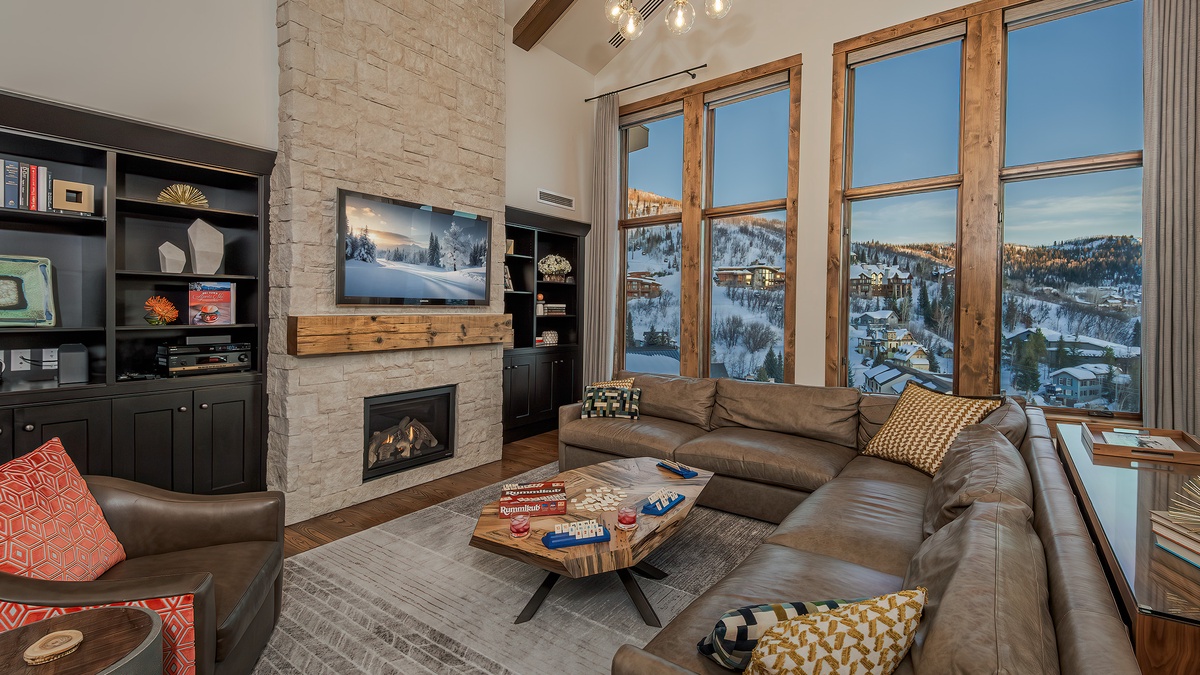 Great Room, Main Level - Vaulted ceilings, fireplace, and mountain views