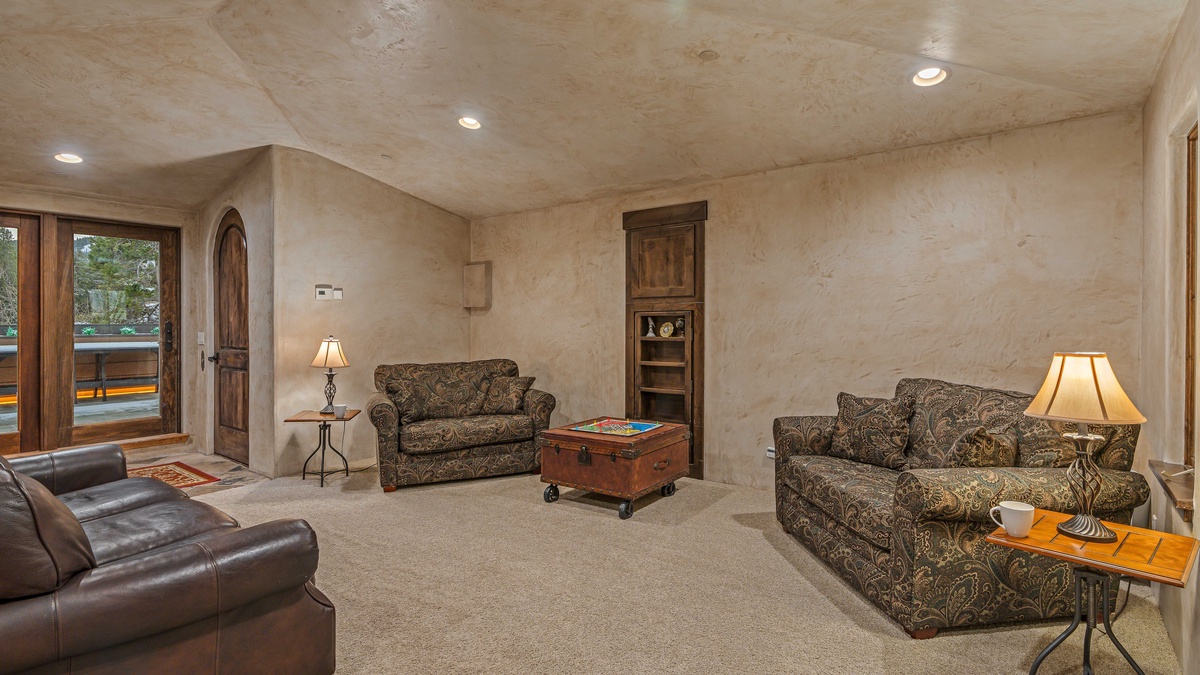 Loft level family room with full and two twin sleeper sofas