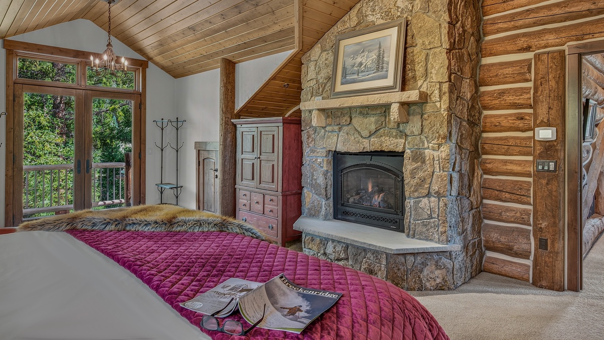 Bedroom 1, Upper Level - Primary king bedroom with fireplace