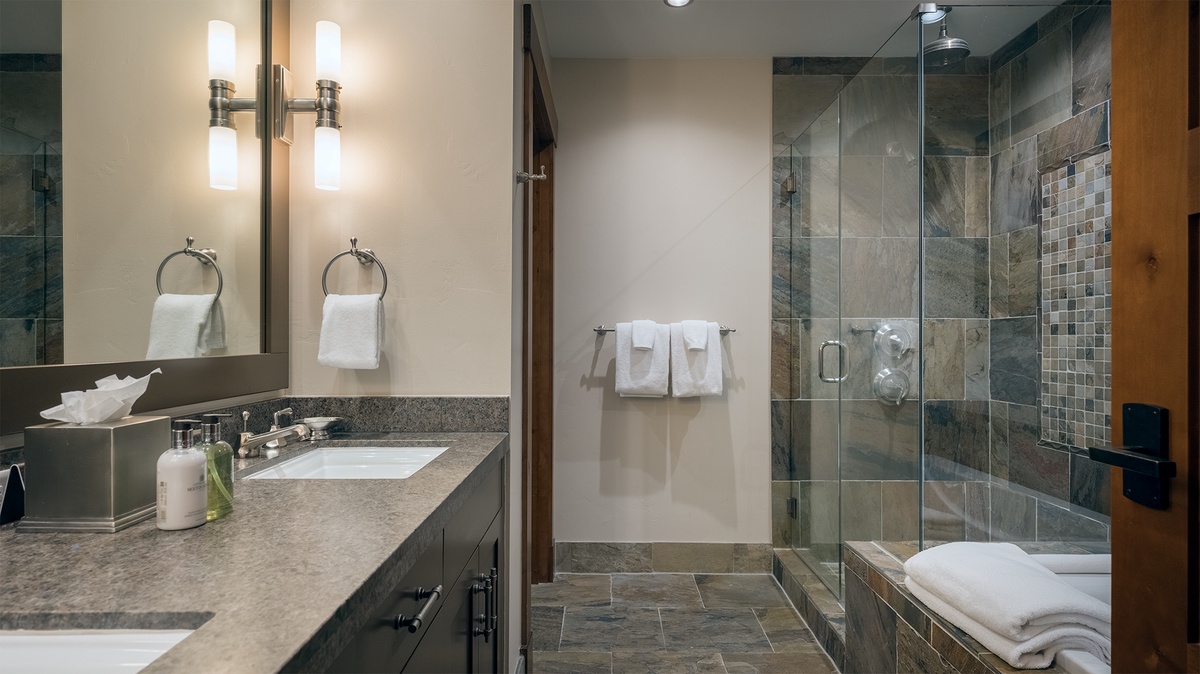 Bedroom 2, Main Level - Ensuite with single vanity and walk-in shower