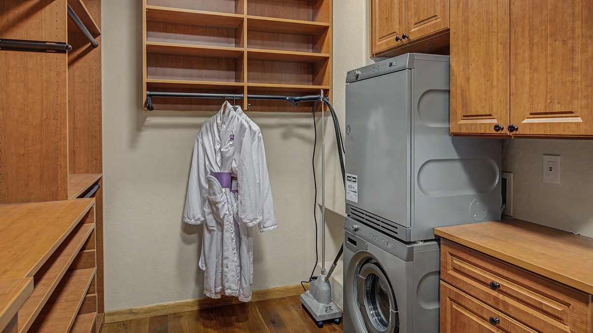 Bedroom 1, Main Level - Primary ensuite walk-in closet with washer and dryer