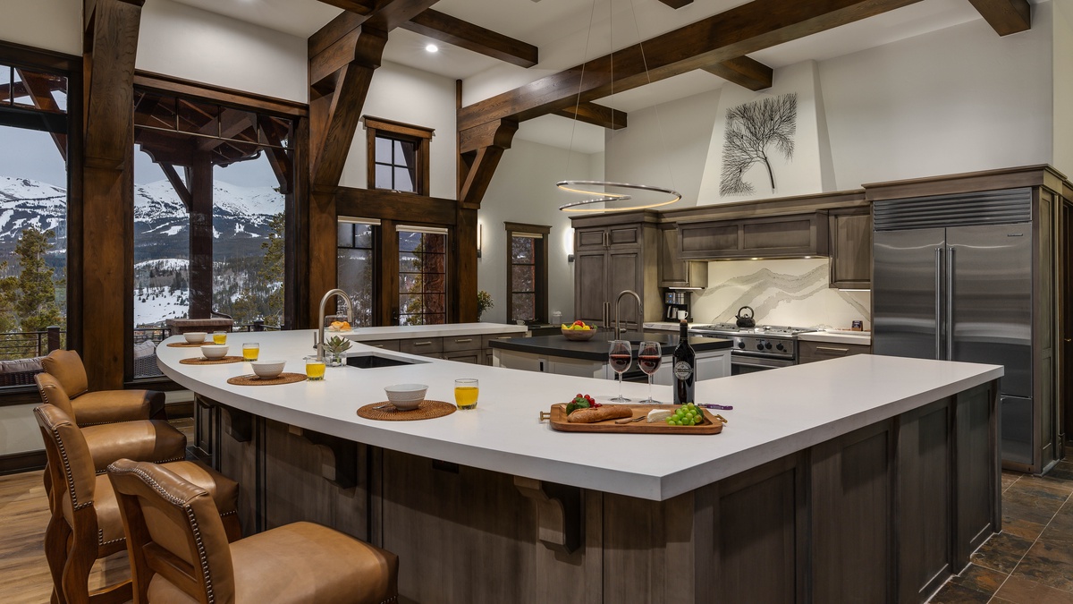 Gourmet kitchen with breakfast bar seating