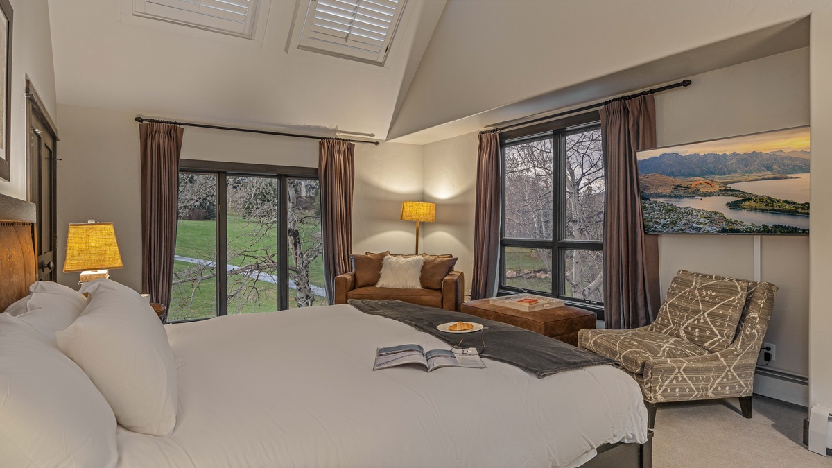 Bedroom 1, Upper Level - Primary king suite on upper (5th) level with TV and reading sofa