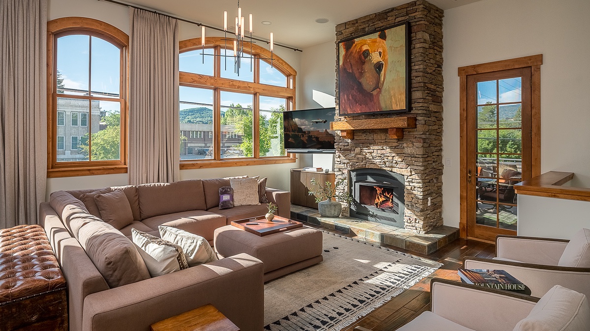 Great Room, Main Level - Fireplace with TV and seating area
