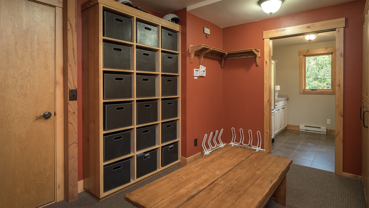 Mudroom, Main Level - Built-in storage cubbies and gear hooks.