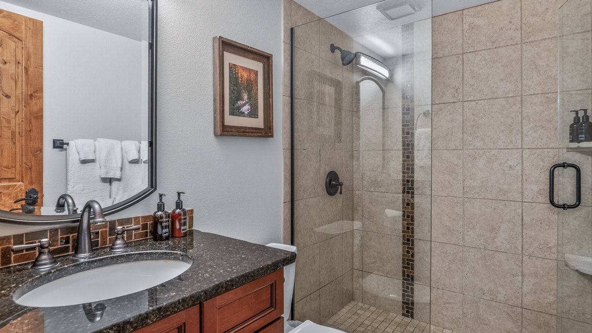 Bedroom 1, Main Level - Primary ensuite with walk-in shower