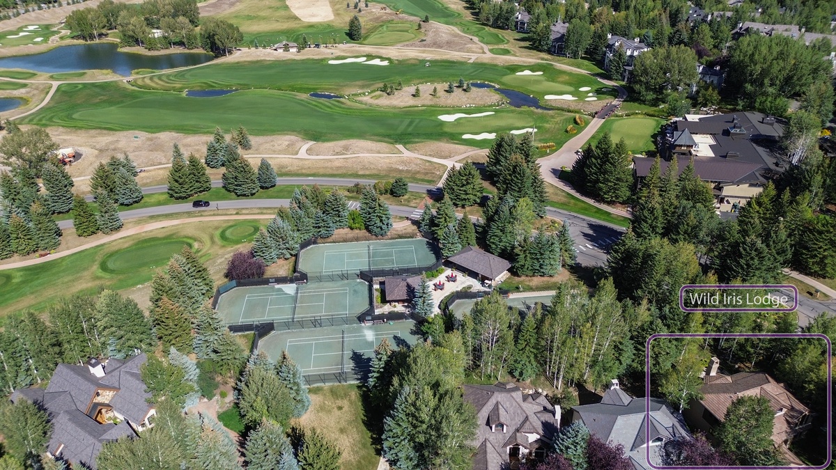 Exterior - Aerial view with golf course and tennis courts