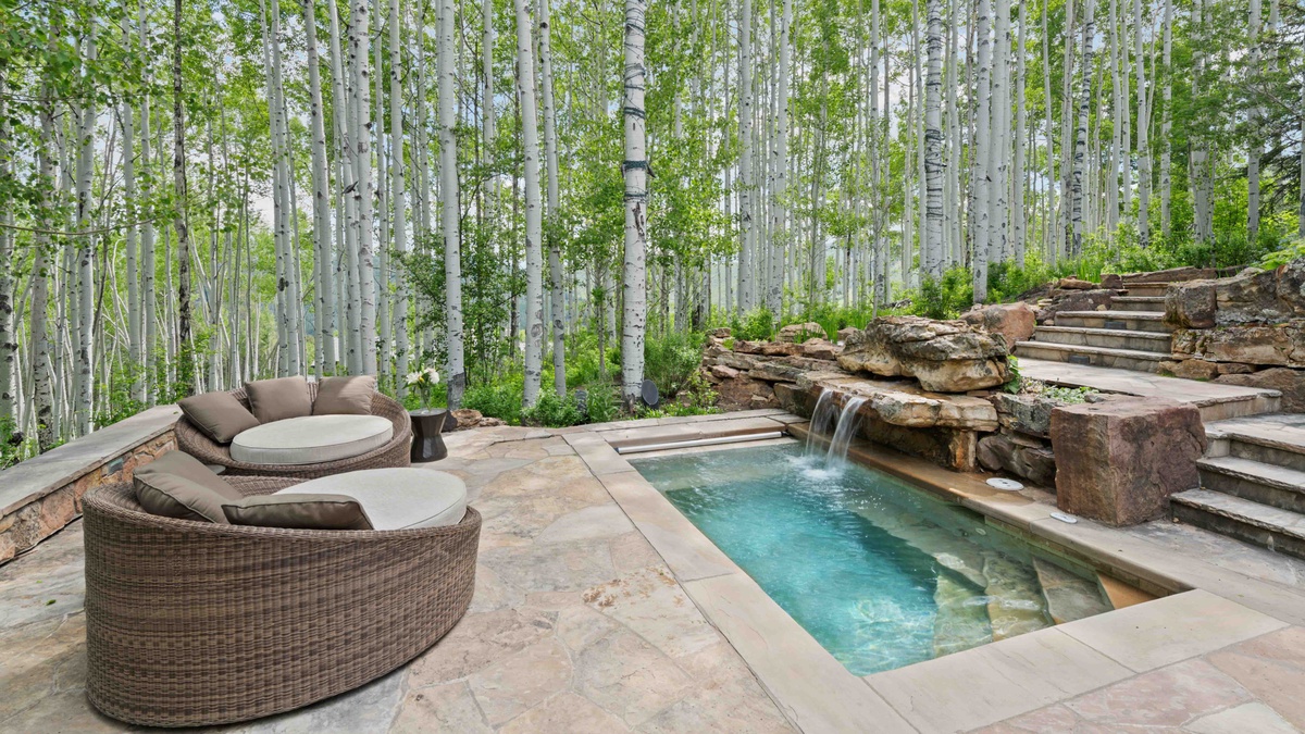 Surrounding by Aspen groves, Paragon's outdoor patio and in ground hot tub are nothing short of spectacular