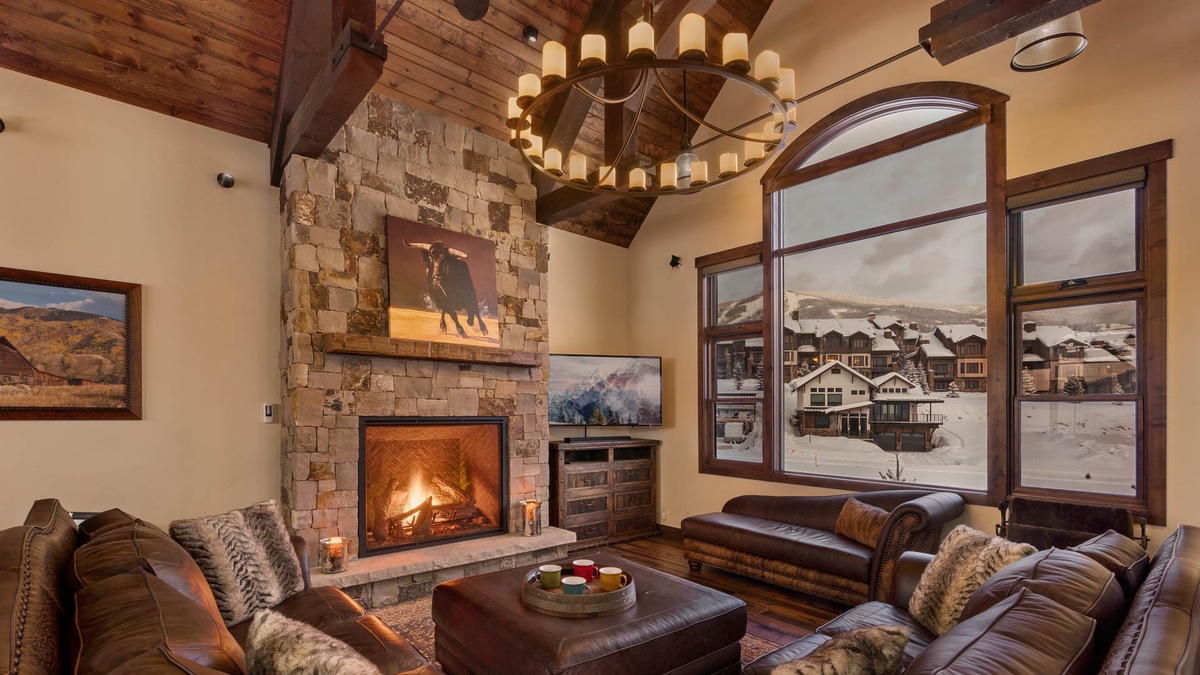 Great Room, Upper Level - Fireplace with seating area and large windows