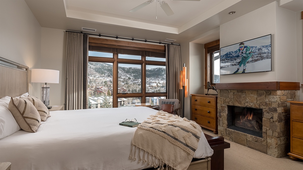 Bedroom 1, Main Level - Primary king bedroom with fireplace