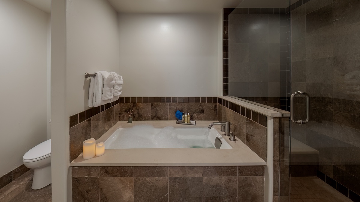 Bedroom 4, Main Level - Ensuite with soaking tub and walk-in shower