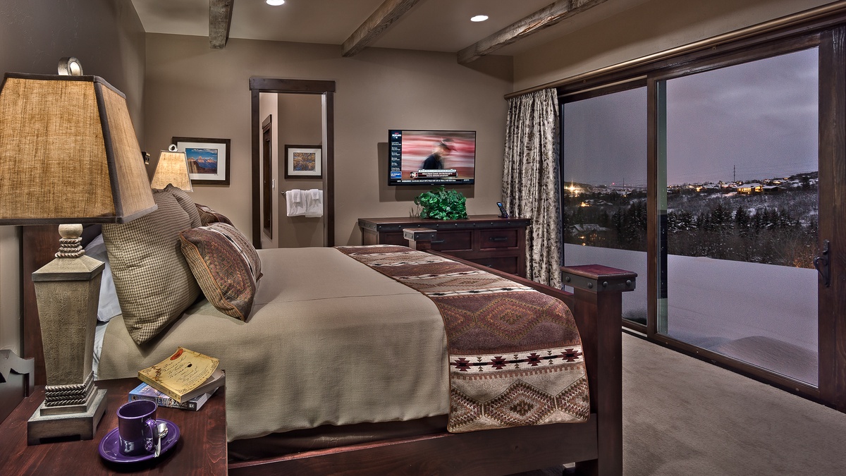 King suite on lower level with patio access