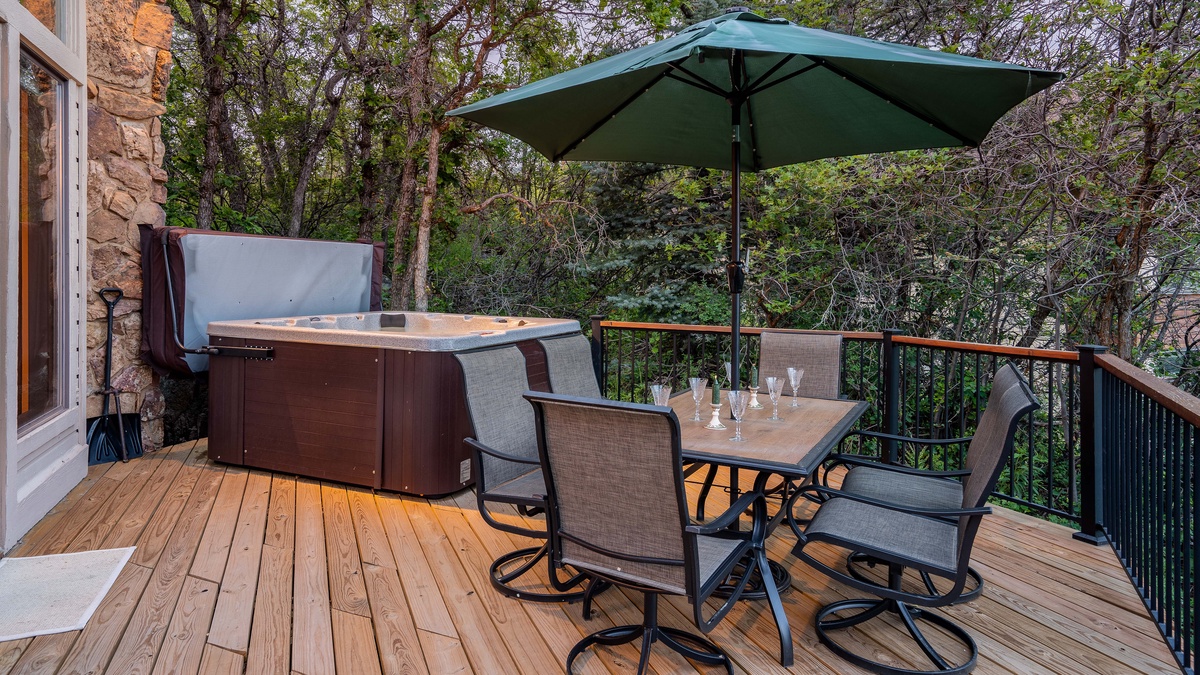 Deck, Main Level, Glacier Lodge East - Outdoor dining table with umbrella and adjacent hot tub
