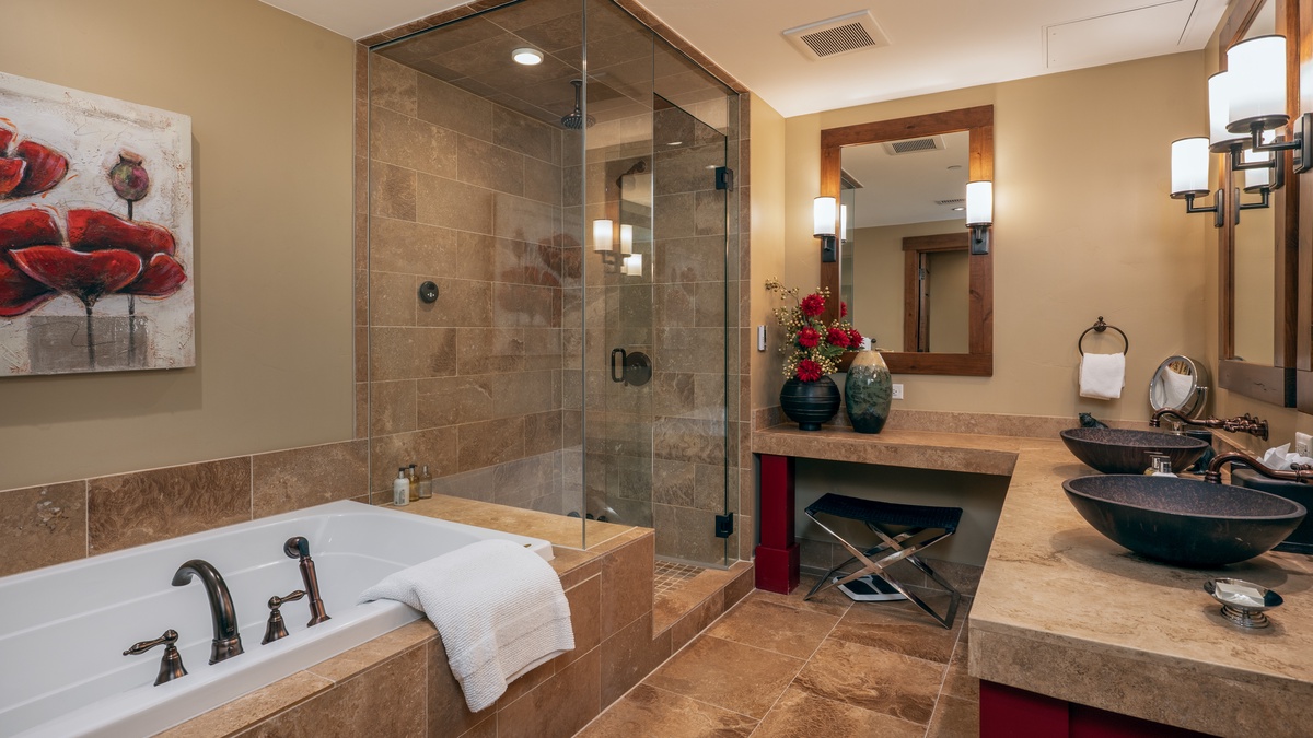 Bedroom 1, Main Level - Primary ensuite with soaking tub and walk-in shower